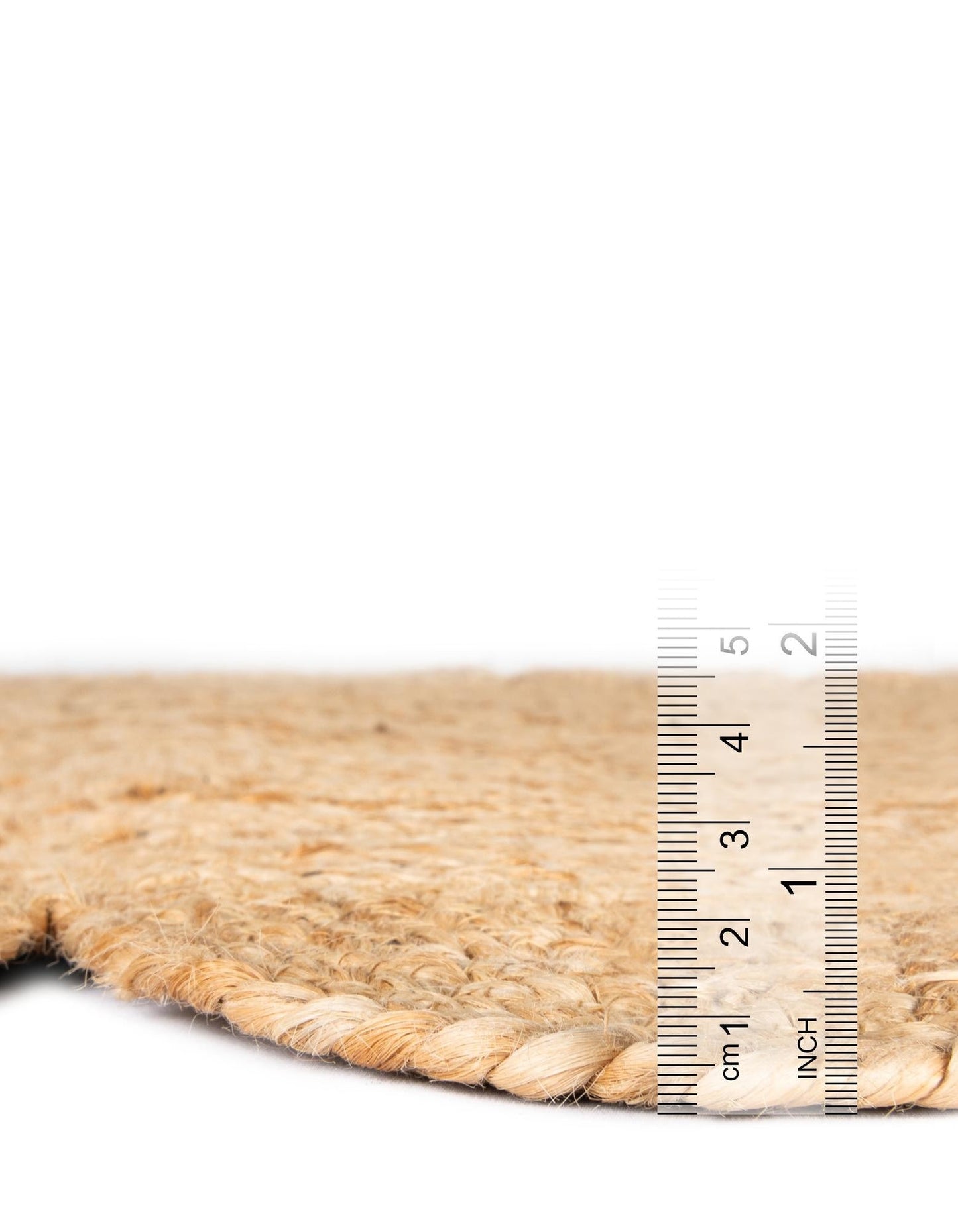 Rug with a ruler for scale on a white background