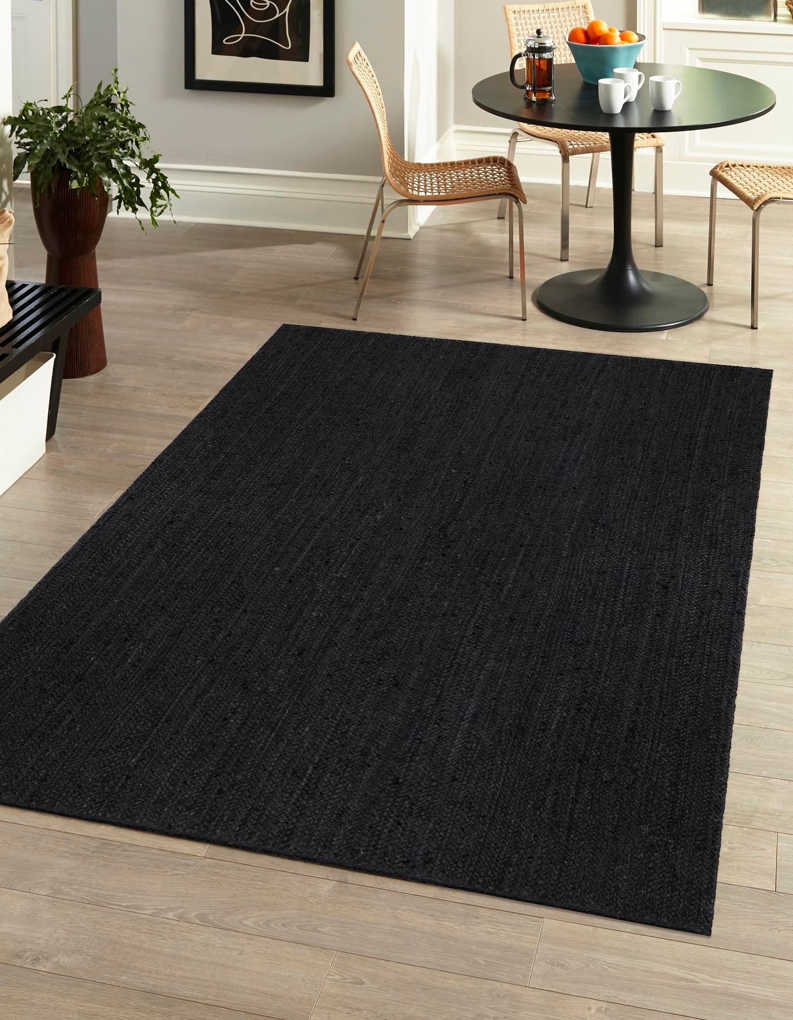 Black handwoven jute area rug in living room modern farmhouse decor durable natural fiber carpet
