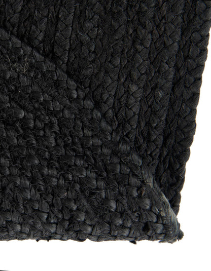 Close-up of a textured black fabric with a diamond pattern
