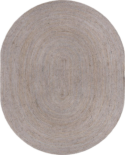 Oval braided rug with a textured pattern on a white background
