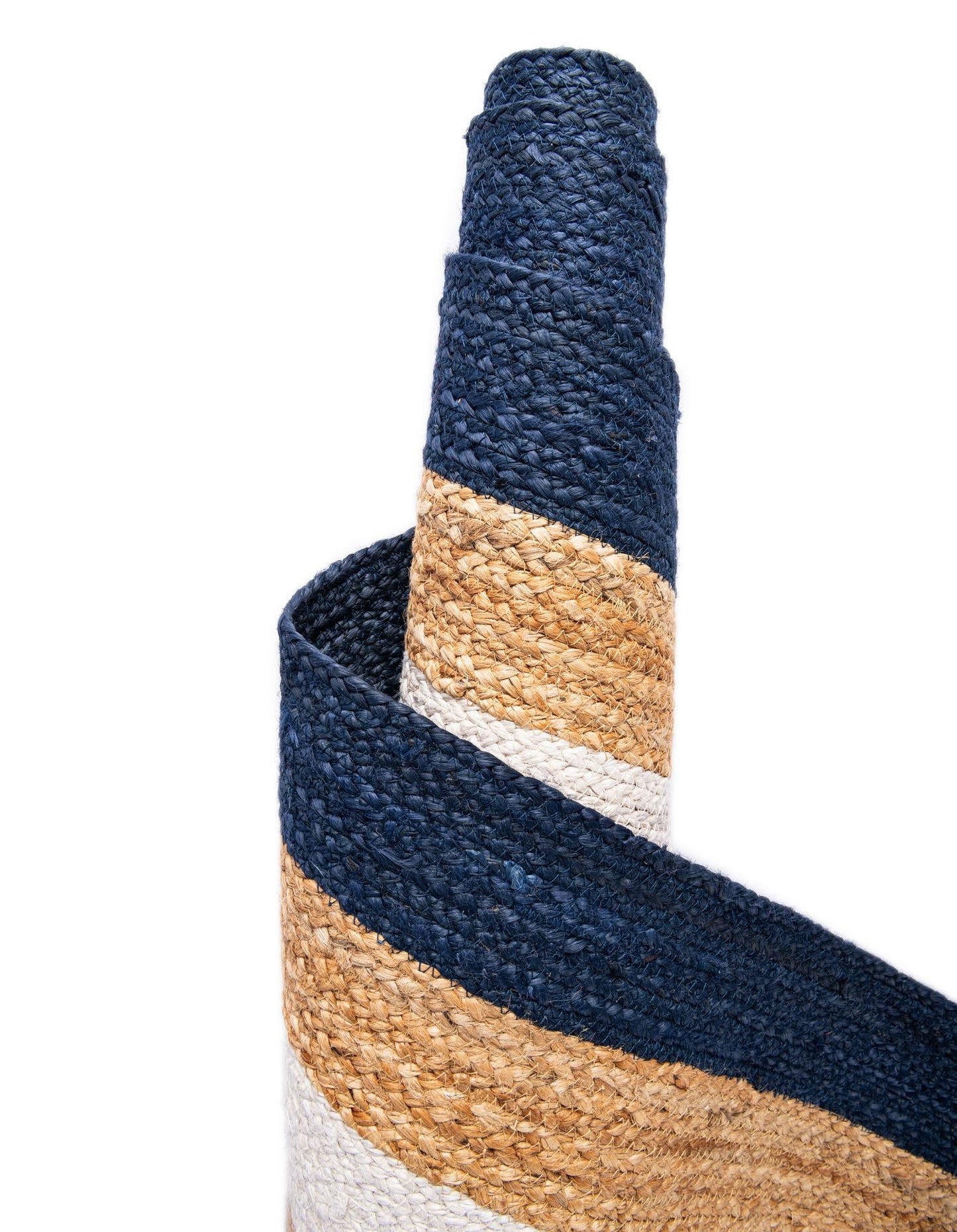 Close-up of a woven basket with blue, beige, and white stripes on a white background