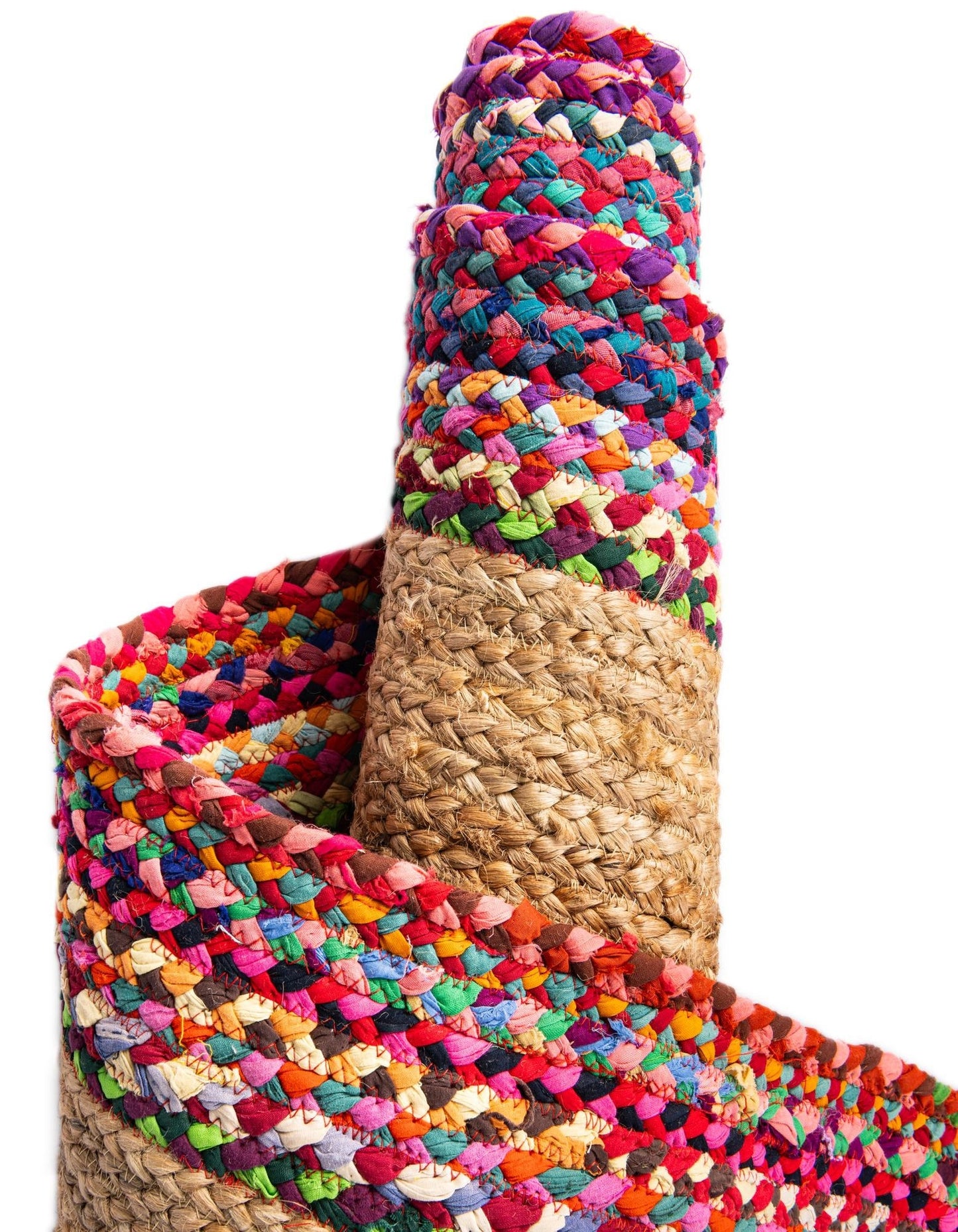 Multicolored braided rug with natural fiber base on a white background