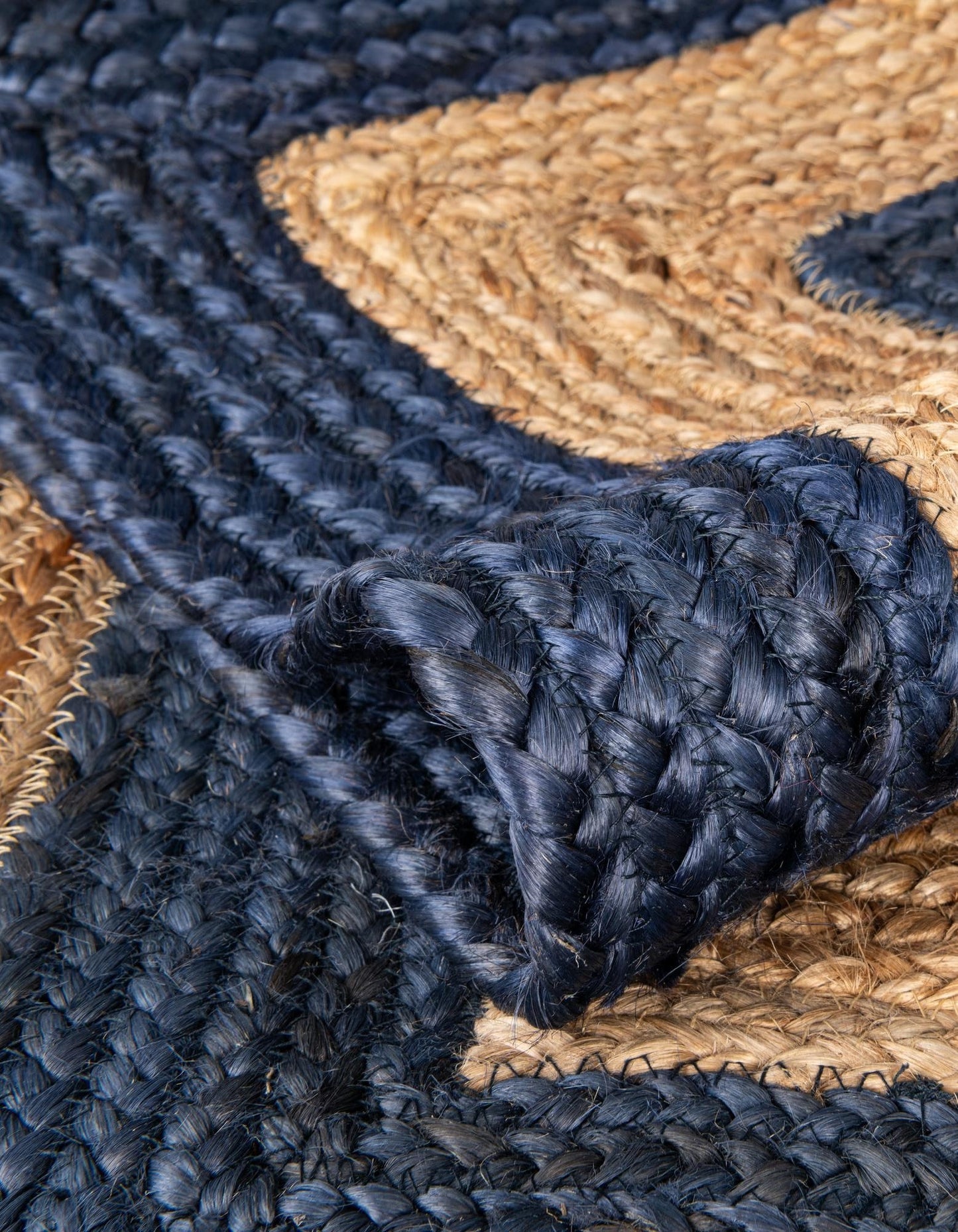 Close-up of a blue and beige woven rug