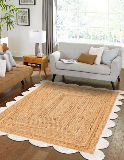 Beige jute rug in a living room setting with a sofa and coffee table.