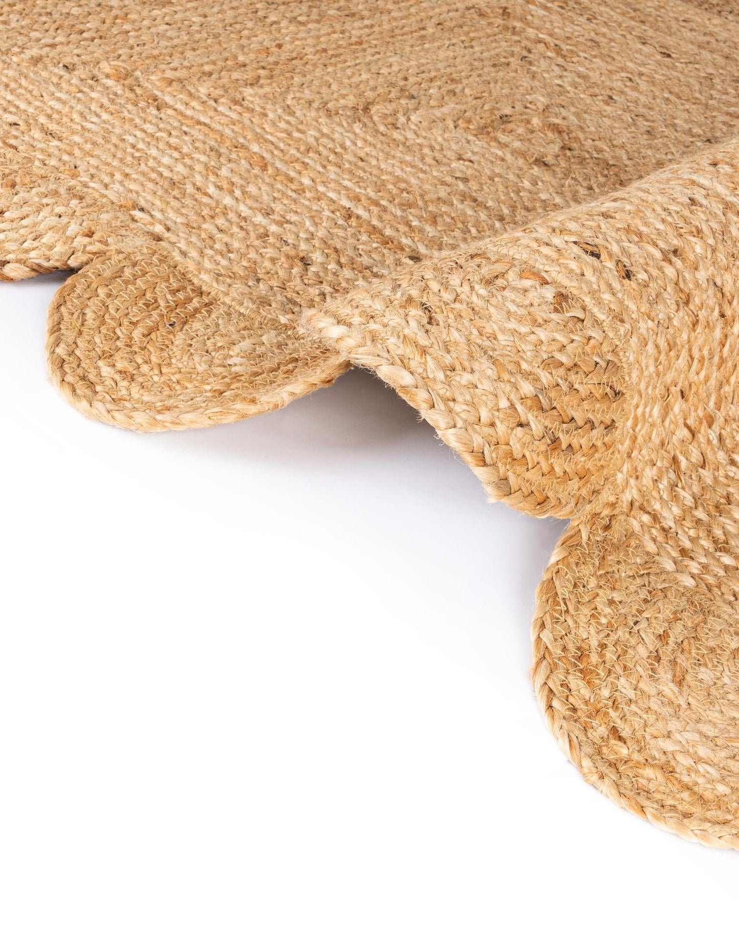 Close-up of a textured beige fabric on a white background