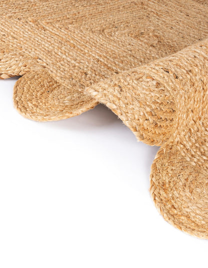 Close-up of a textured beige fabric on a white background