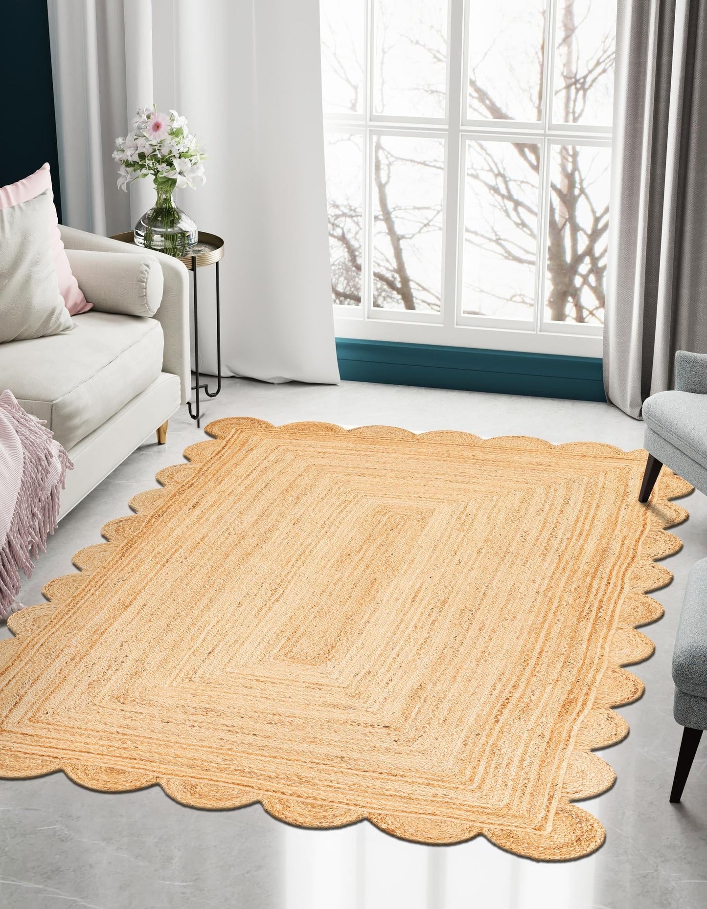 Beige woven rug on a light gray floor with a white sofa and decorative items in the background.