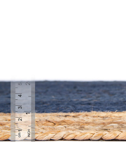 Rope with a ruler showing measurements against a white background