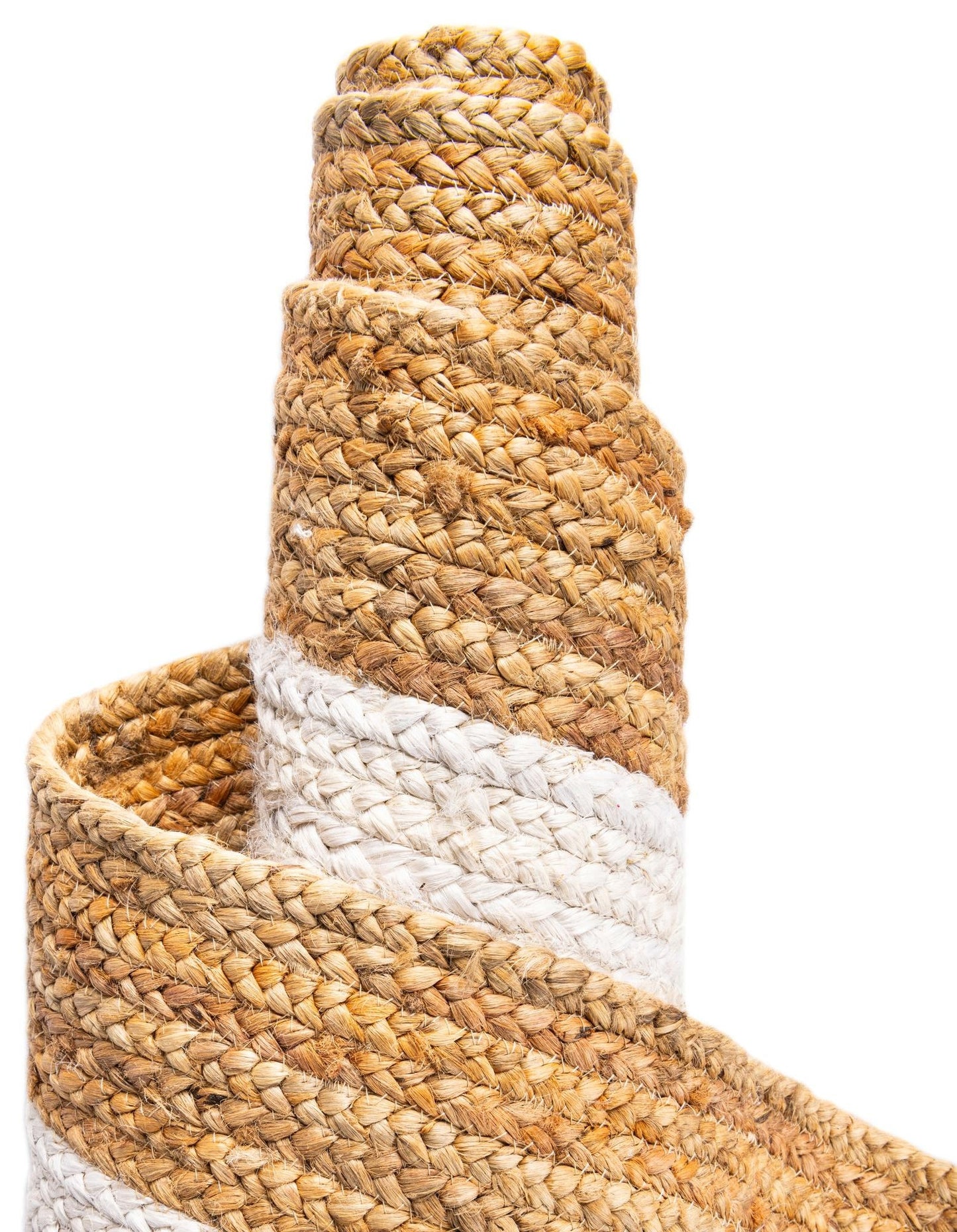 Close-up of a woven jute rug with natural and white stripes on a white background