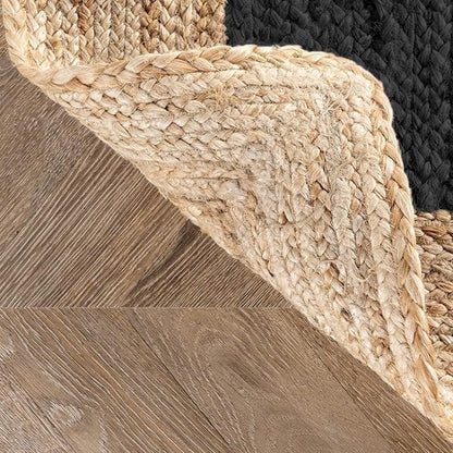 Close-up of woven jute rug on wooden floor