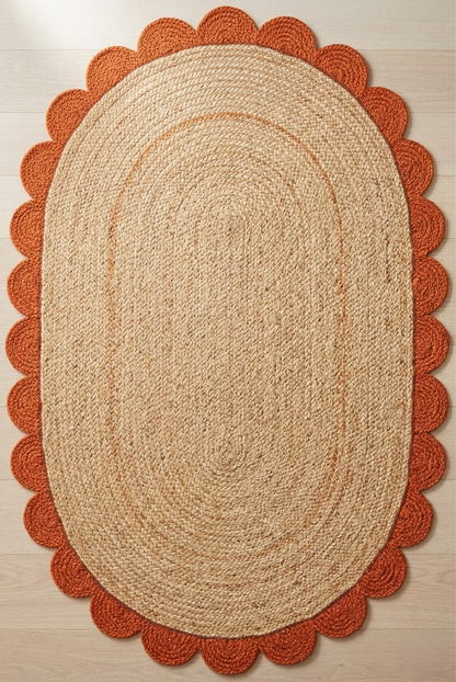 Oval natural jute area rug with orange scalloped edge, handcrafted woven floor rug for bedroom, entryway, kitchen, office, and warm modern home décor